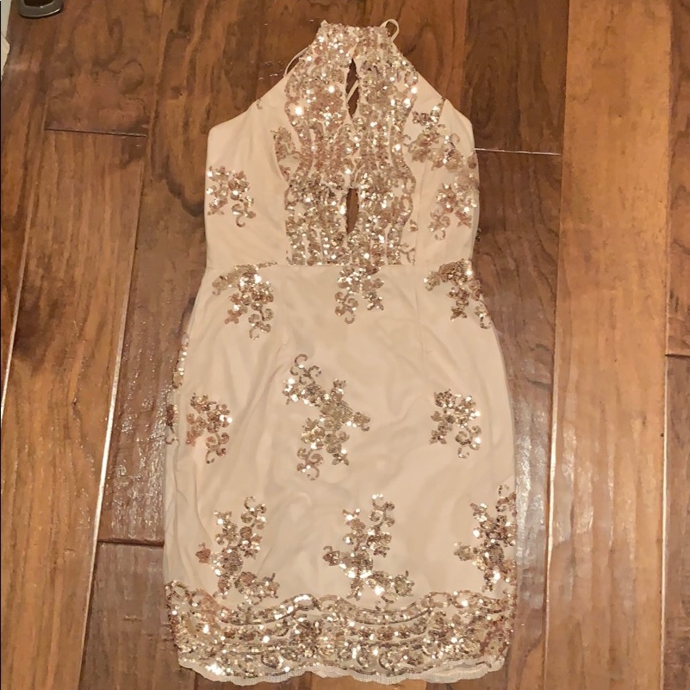 Sequins dress gold in color , adjustable straps